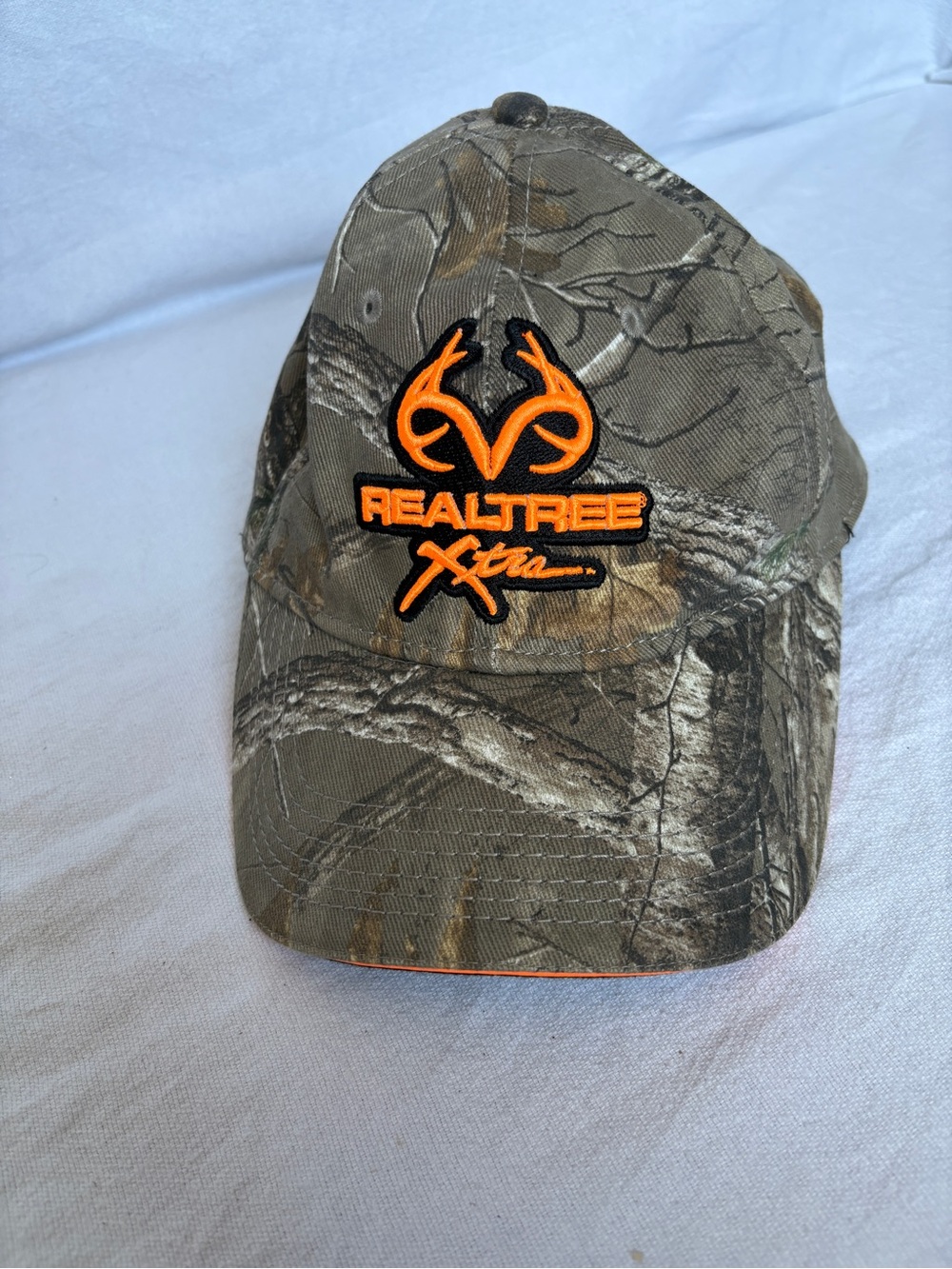 Realtree Camo Hat with Bright Orange Logo